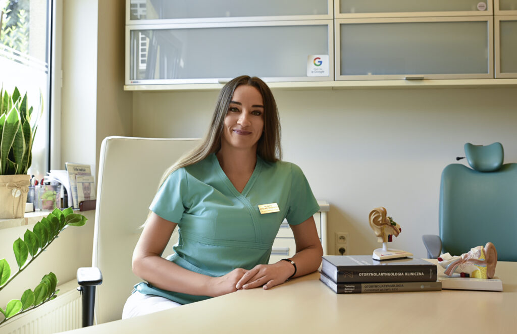a woman sitting at a desk